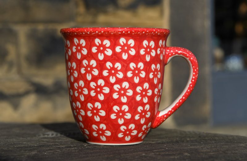 Polish Pottery Large Curved Mug White Flower on Red by Ceramika Manufaktura Boleslawiec pottery.